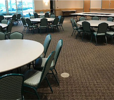 Chairs and Tables in Large Room