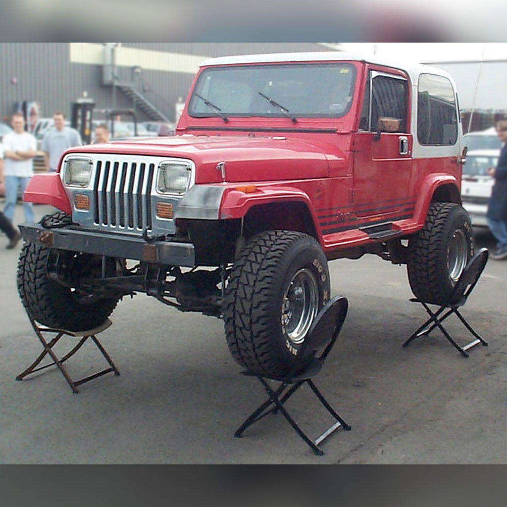 4 SwiftSet Folding Chairs supporting a Jeep