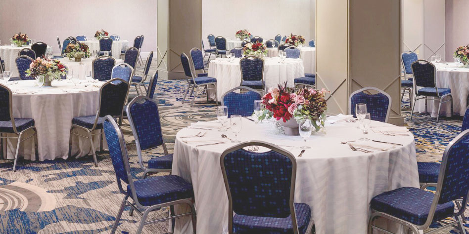 Chairs and Round Tables Setup in Large Banquet Room
