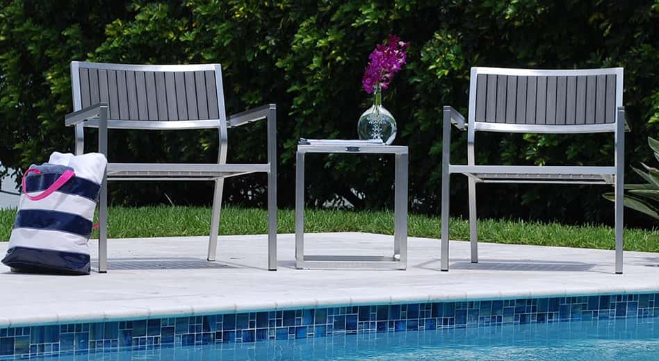 poolside metal armchairs and side table