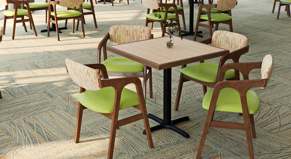 A room full of stylish wooden frame chairs at dining tables